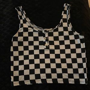 Black and white checkered tank top, size L, sort of short but not a crop top